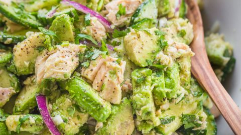 Avocado Tuna Salad in serving bowl with a spoon