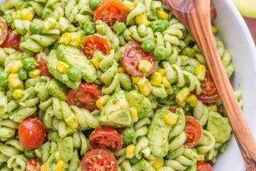 The secret ingredient in this Creamy Avocado Pasta Salad recipe will impress you! This avocado pasta salad is easy, creamy, vibrant, fresh and so satisfying! | natashaskitchen.com