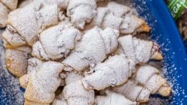 My Mother is famous for her Rugelach Recipe! These walnut-cranberry-apricot rugelach cookies are soft, crumbly, flaky, loaded! They always disappear fast! | natashaskitchen.com