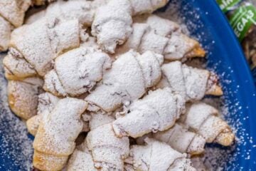 My Mother is famous for her Rugelach Recipe! These walnut-cranberry-apricot rugelach cookies are soft, crumbly, flaky, loaded! They always disappear fast! | natashaskitchen.com