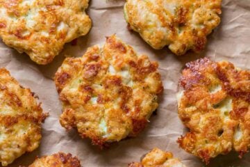 Cheesy Chicken Fritters always get glowing reviews. If you love easy chicken recipes, this is your recipe! Easy, juicy, flavorful cheesy chicken fritters aka chicken patties! | natashaskitchen.com