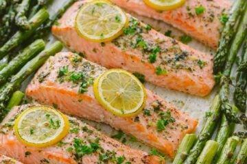 One-Pan Salmon Asparagus recipe with a lemon-garlic-herb butter. Every bite is so juicy and flavorful! A reader favorite, 20-minute salmon dinner. | natashaskitchen.com