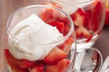 Strawberries Romanoff is a no-bake, easy, luscious summer dessert. Strawberries Romanoff feels fancy but it is simple to make and perfect for parties! | natashaskitchen.com