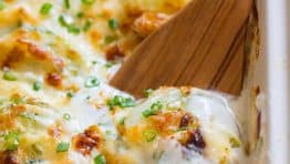 Creamy, cheesy Zucchini Potato Bake in a garlic Alfredo sauce. This potato bake recipe has simple ingredients, comes together quickly and tastes so good! | natashaskitchen.com