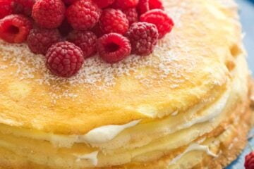 This crepe cake is beautiful and delicious! The fail-proof blender crepes recipe makes this the easiest 30 layer cake you'll make! Best crepe cake frosting! | natashaskitchen.com