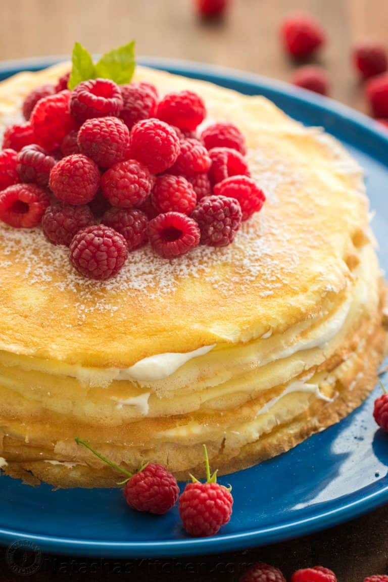 This crepe cake is beautiful and delicious! The fail-proof blender crepes recipe makes this the easiest 30 layer cake you'll make! Best crepe cake frosting! | natashaskitchen.com