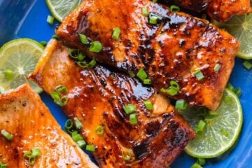 Sauteed Honey-Glazed Salmon is juicy, flaky, easy and so satisfying! Squeeze fresh lime juice over this pan fried honey glazed salmon and serve white rice. | natashaskitchen.com