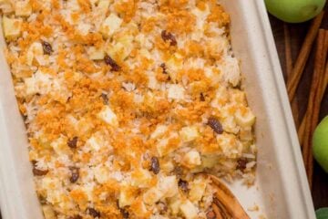 Apple rice pudding is Autumn comfort food. It is loaded with apples, cinnamon and a browned butter crunchy topping. A great way to use leftover white rice! | natashaskitchen.com
