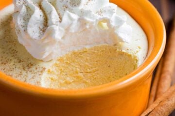 Pumpkin mousse cups have the taste and texture of whipped pumpkin pie. Smooth and airy pumpkin mousse recipe with the best rum-infused whipped cream! | natashaskitchen.com
