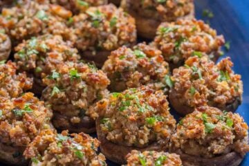 Sausage Stuffed Mushrooms are crunchy on top with a creamy and juicy center. They are loaded with flavor and really stand out as a holiday party appetizer. | natashaskitchen.com