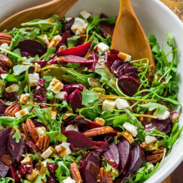A show-stopping and flavorful beet salad with arugula with balsamic vinaigrette. It&rsquo;s gluten free, vegetarian and perfect for entertaining.
