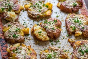 Smashed potatoes on baking sheet