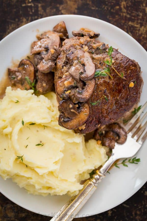 Filet mignon steak served with mashed potatoes 