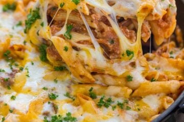 What is a lasagna casserole? This easy lasagna pasta bake has all the same elements of a classic lasagna, but the process is so easy! Everything is combined in a casserole dish (no layering) and this lasagna recipe bakes way faster! | natashaskitchen.com
