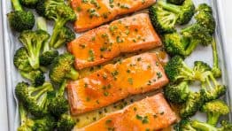 Apricot Dijon Salmon and Broccoli is an easy, excellent one-pan salmon meal. The sweet and savory apricot glaze seals in the juices of the salmon making it moist and flaky. You will enjoy every bite of this apricot glazed salmon. Learn: What is the difference between wild caught and farmed salmon