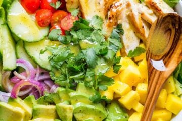 Chicken Mango Avocado Salad recipe in a bowl served like Cheesecake Factory recipe (copycat).