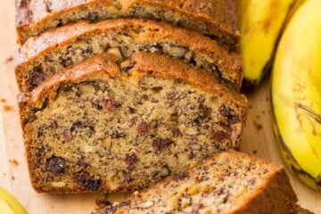 Sliced moist banana nut bread with overripe bananas