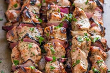 A simple, excellent recipe for Grilled Pork Shish Kabobs. See our tips and tricks for flavorful and tender, crowd pleasing pork kabobs. | natashaskitchen.com