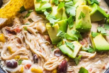 This White Chicken Chili is done in less than an hour start to finish in the Instant Pot with melt-in your mouth tender chicken. Stir everything together in the instant pot, top with cream cheese and set for 20 minutes.