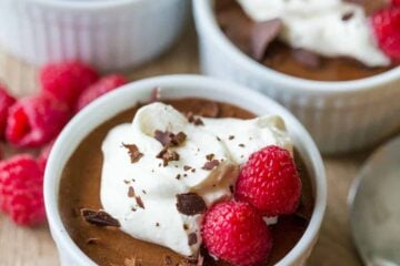 How to make Classic Chocolate Mousse that is decadent, airy and luxuriously chocolatey. Easy, sophisticated chocolate dessert with whipped cream and raspberries. #chocolatemousse #mousse #chocolatedessert #dessert #natashaskitchen #valentinesday #valentinesdaydessert #classicchocolatemousse #frenchchocolatemousse