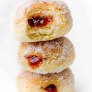 stack of 3 baked donuts