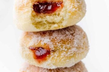 stack of 3 baked donuts