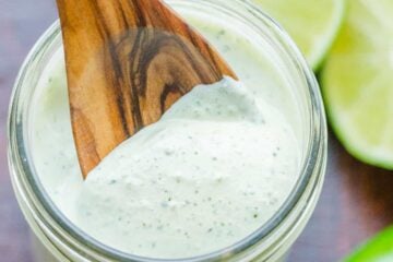 Jalapeno ranch in mason jar with spoon in jar