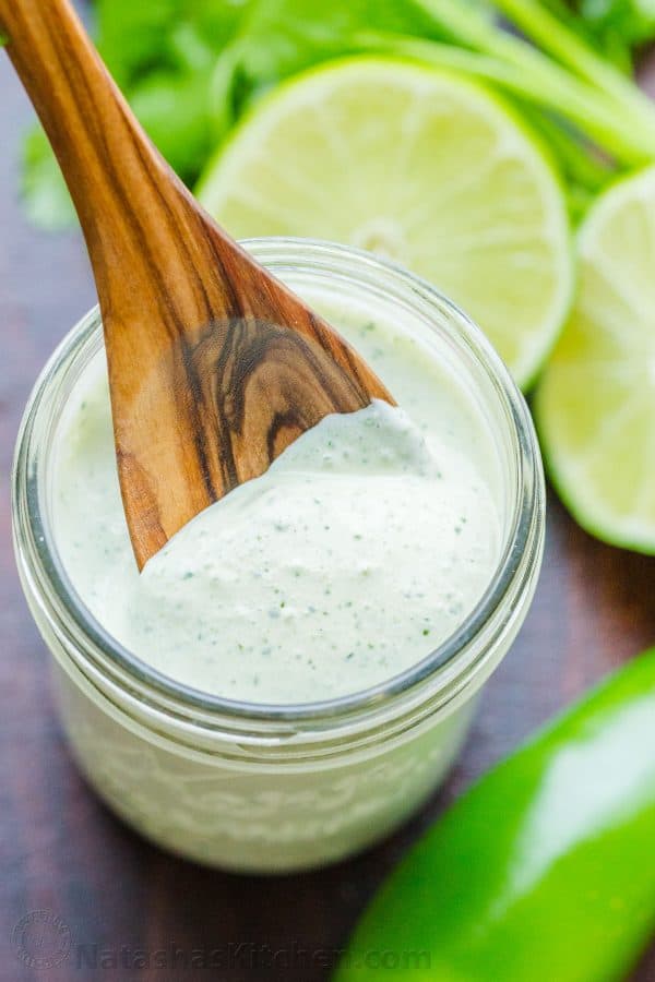Jalapeno ranch in mason jar with spoon in jar