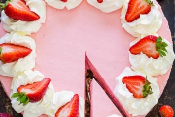 No bake strawberry cheesecake with slice cut for serving