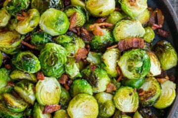 Roasted brussels sprouts in a bowl with bacon