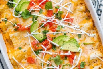 Chicken enchiladas in casserole dish