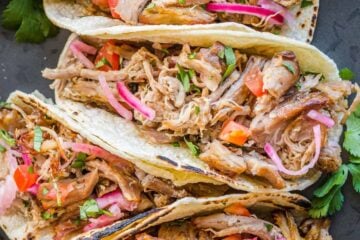 Pork Carnitas in tortillas to make carnita tacos