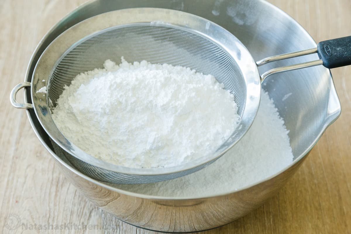 How to sift powdered sugar over a metal bowl