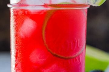 blackberry limeade garnished with limes