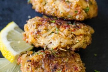 Crab Cakes on serving platter with lemon slices