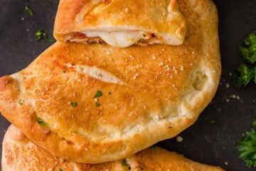 Baked Calzones served with marinara sauce