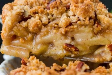 Slice of dutch apple pie with crumb topping