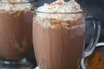 homemade hot chocolate in mugs with whipped cream