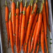 Roasted carrots on a baking sheet