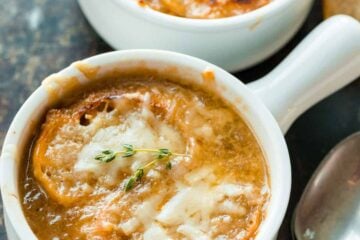 French Onion soup served in bowls with toasted breads