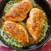 Spinach stuffed chicken breast in skillet