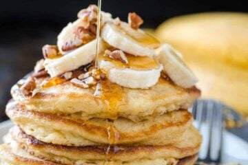 Banana pancakes stacked on a plate