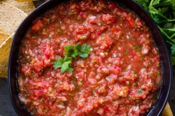 Fresh homemade salsa in a bowl with tortilla chips