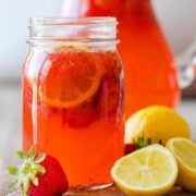 Homemade strawberry lemonade in a mason jar