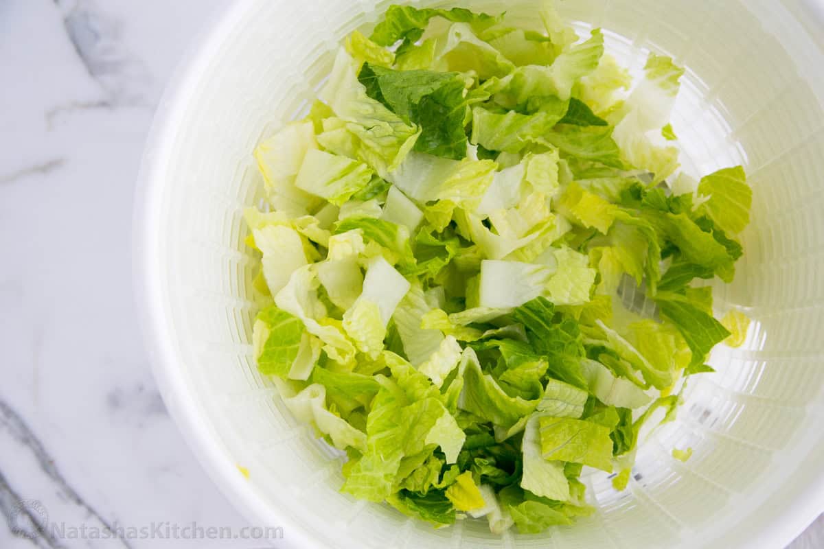 Romaine lettuce in salad spinner prepped for salad