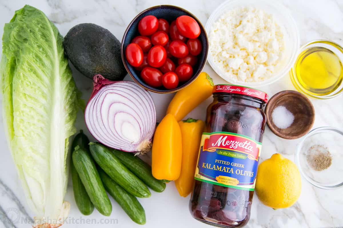 Ingredients for Greek Salad with cucumbers, tomatoes, kalamata olives and feta cheese