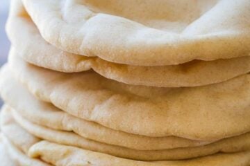 Pita Breads stacked on wire rack