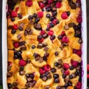 Bread pudding with berries in casserole dish