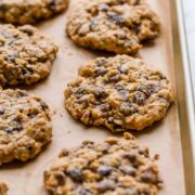 Oatmeal raisin cookies on a baking sheet