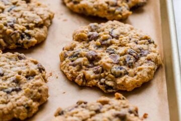 Oatmeal raisin cookies on a baking sheet